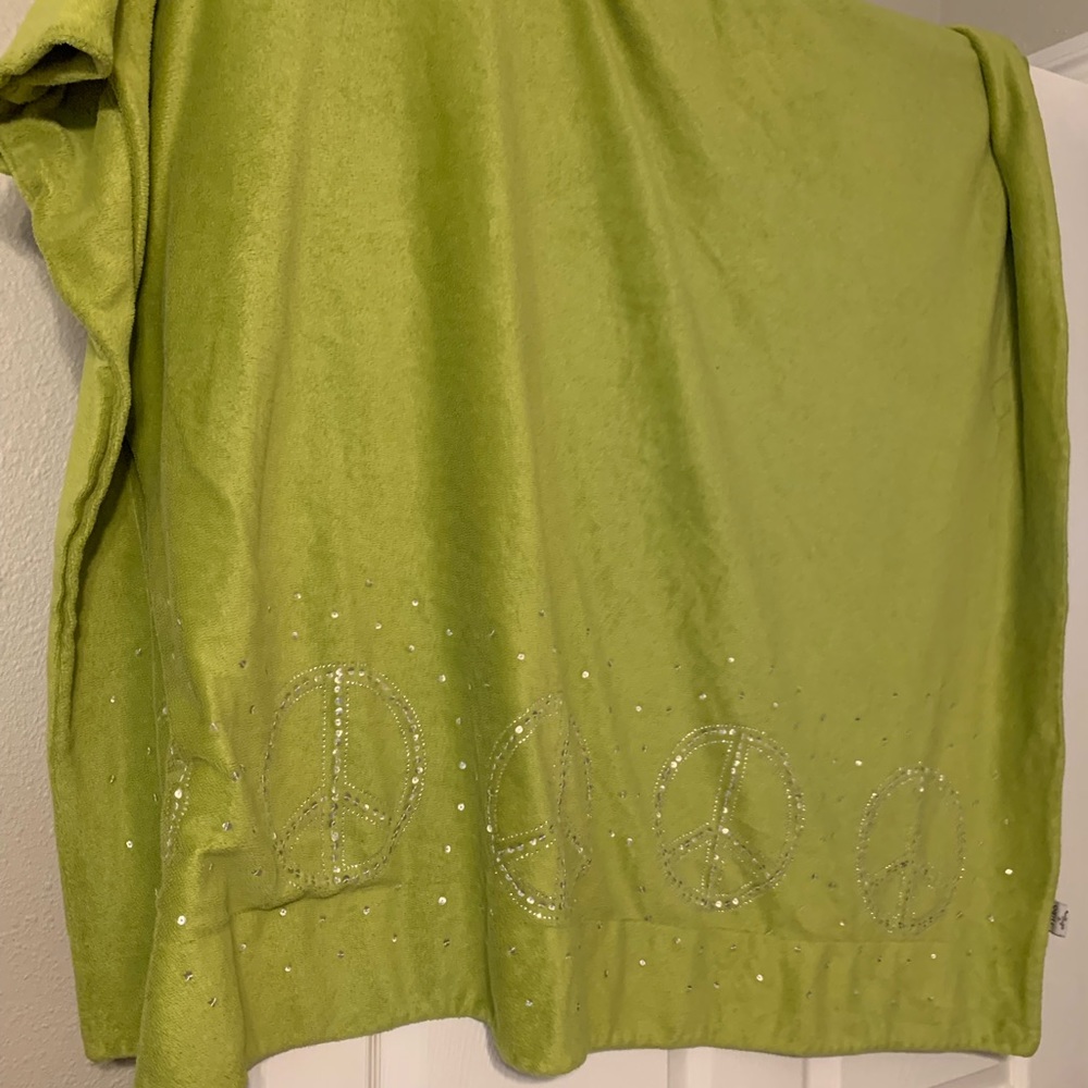 Cozy green peace sign blanket